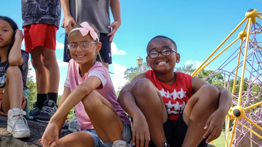 Children smiling outside