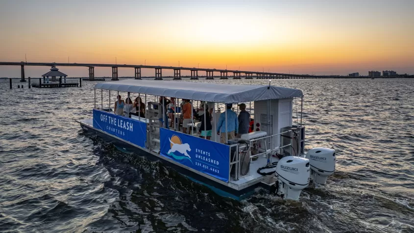 Boat on river during sunset