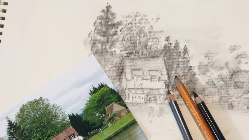 image of a pencil drawing of a picture of a house with green lawn and trees