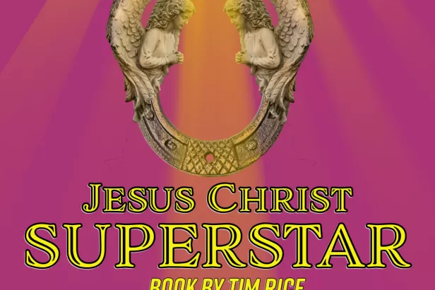 An image of a ray of light highlighting two angels over the title Jesus Christ Superstar
